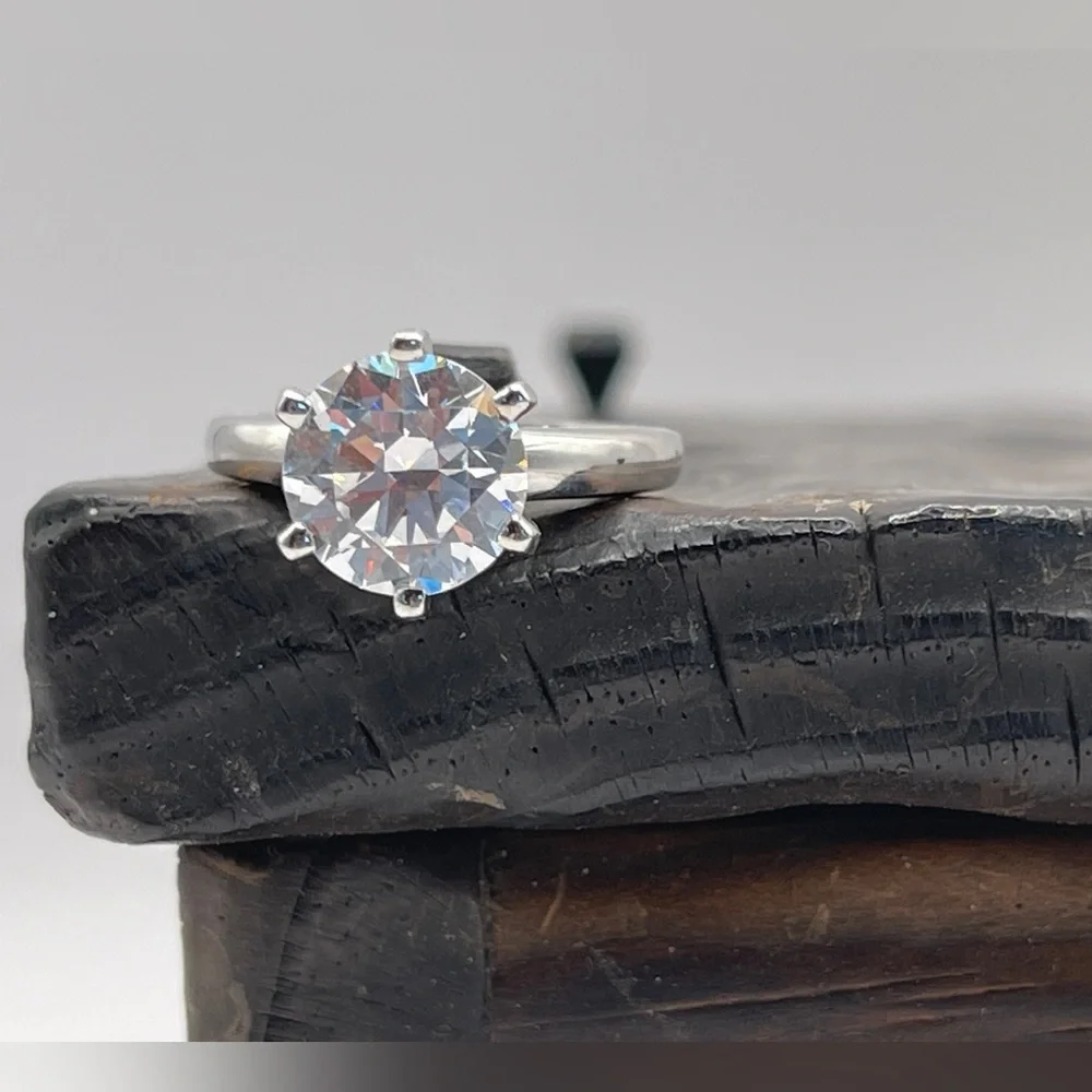 Two (2) carat cz solitaire in a 925 sterling silver setting. Size 6.25.